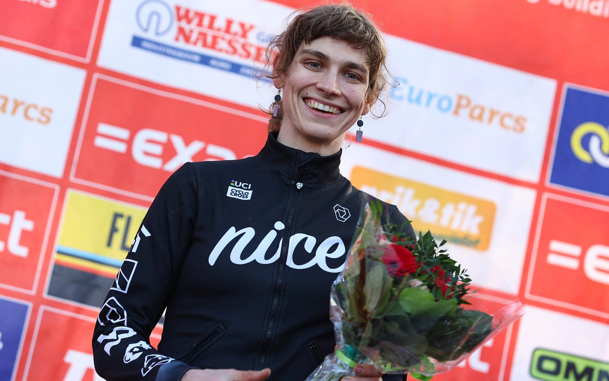 Austin Killips (27) ble tidenes første transkjønnede rytter til å vinne en etappe og ritt sammenlagt på UCI-nivå på kvinnesiden. (Foto: David Pintens/Belga.)