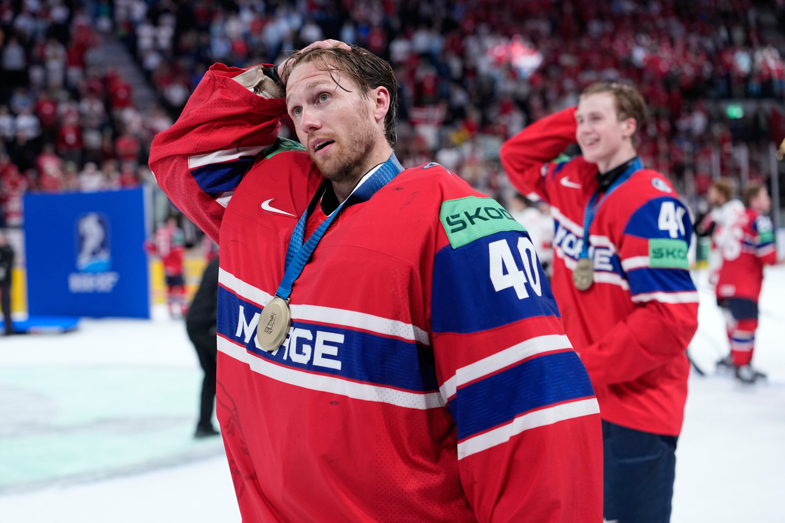 Norway's goalkeeper Henrik Haukeland celebrates after winning the bronze medal ice hockey match between Canada and Norway at the 2026 IIHF Men's Ice Hockey World Championship in Zurich, Switzerland, Sunday, May 31, 2026. (AP Photo/Darko Bandic)