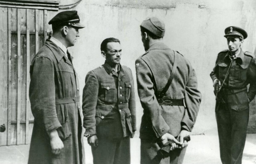 I Norge ble 25 personer henrettet etter landssvikoppgjøret. Blant de mest kjente er Vidkun Quisling og Henry Rinnan (her avbildet i fengsel, etter tydelige tegn på vold.) (Foto: Arbeiderbevegelsens arkiv og bibliotek (1945).)